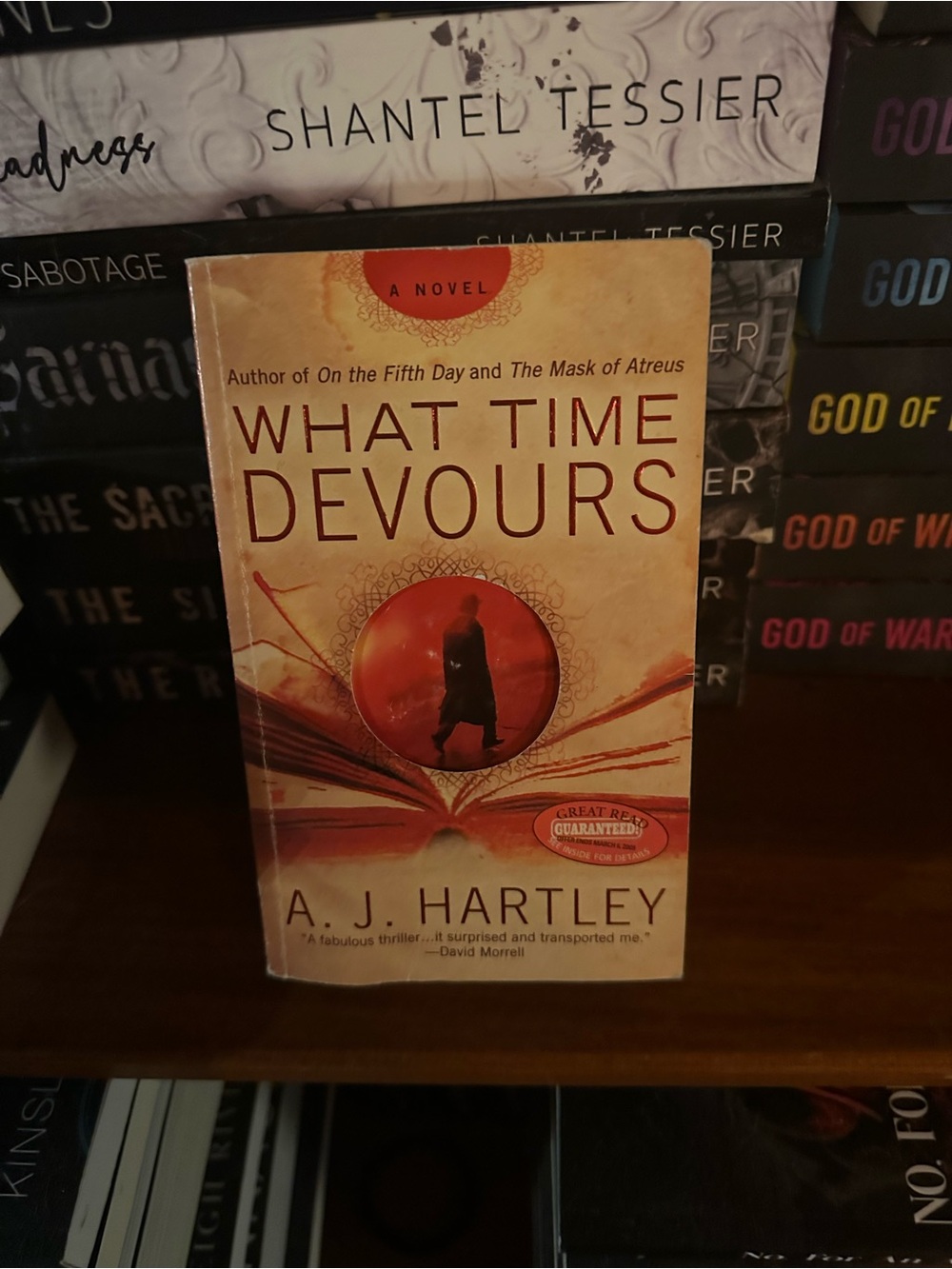 What Time Devours by A. J. Hartley - Beige/Red Paperback